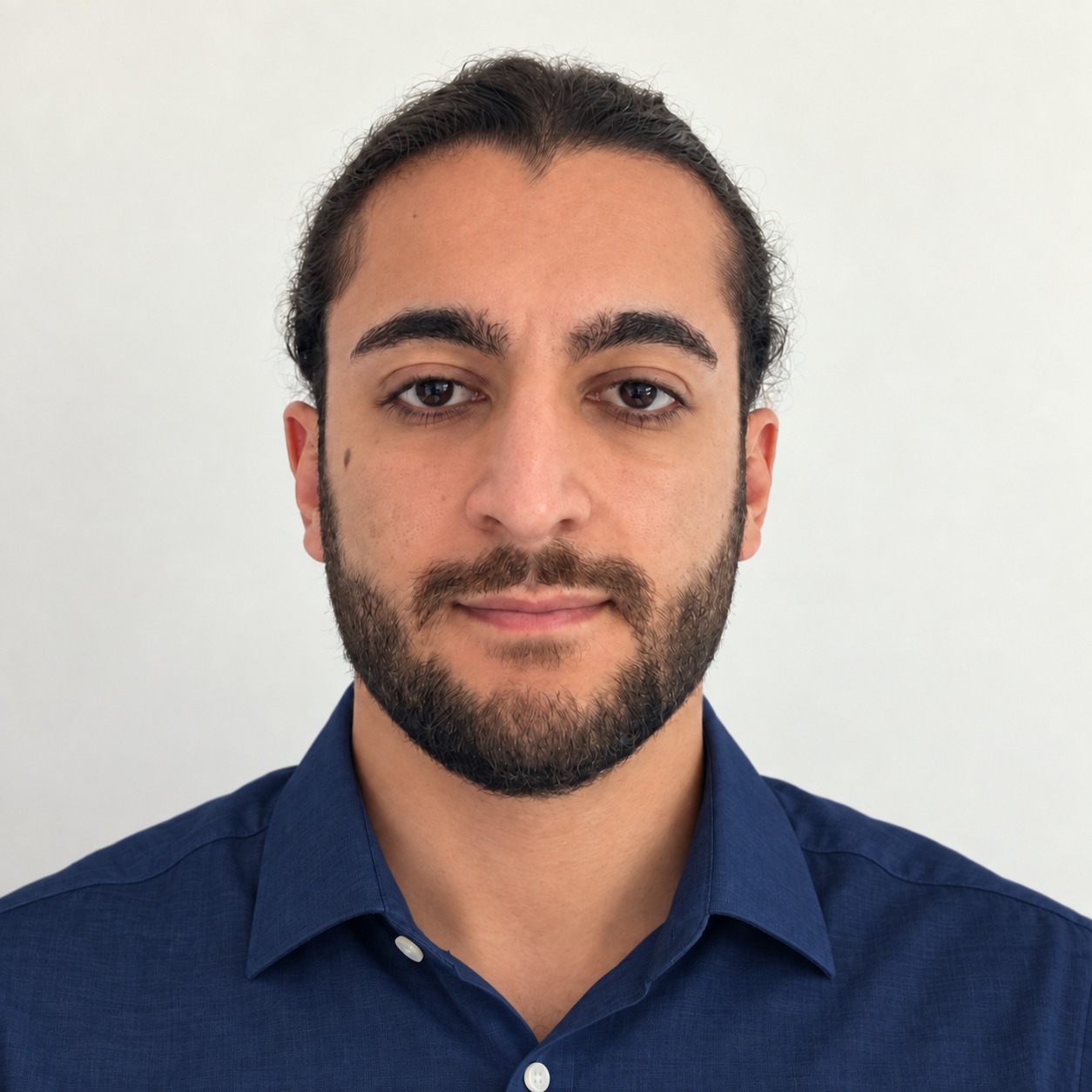 Portrait of Muhammet Sait Bozdemir wearing a navy shirt